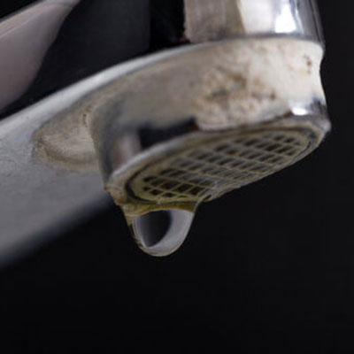 Hard Water Deposits on Faucet